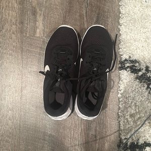 Black Nike running shoes